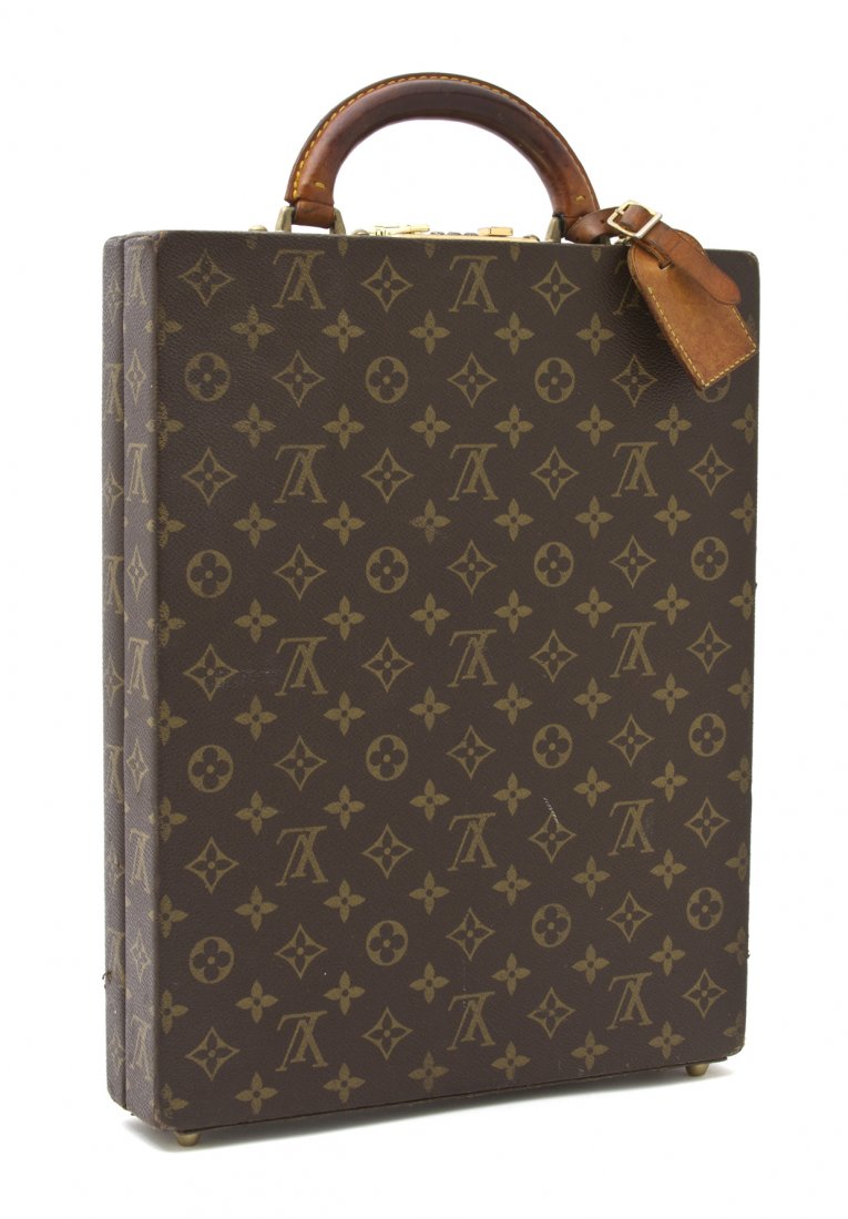 A Louis Vuitton Monogram Canvas Hardsided Briefcas: A Louis Vuitton Monogram Canvas Hardsided Briefcase, brown leather handle, goldtone combination lock, brown leather interior fitted with pockets for pens, business cards, notepads and paper, goldtone