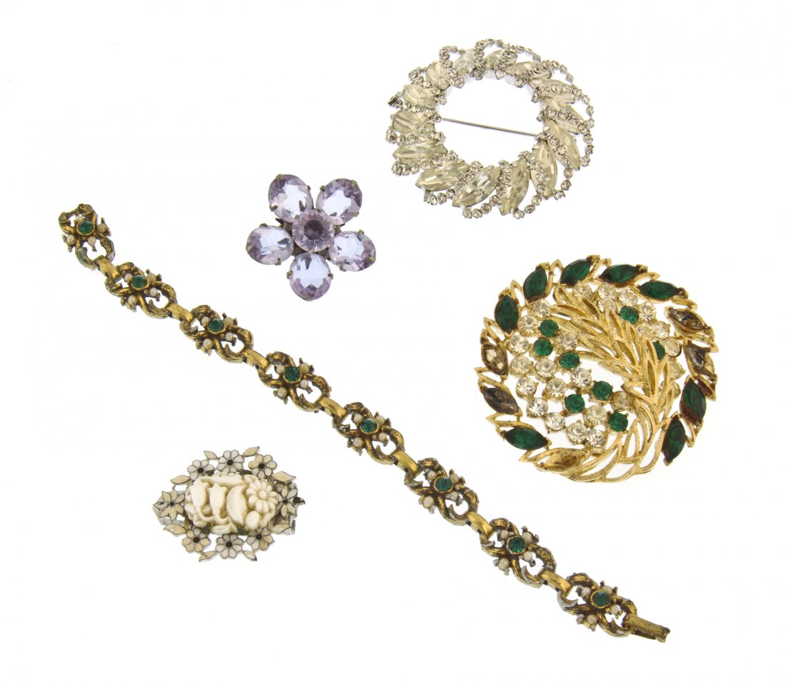 A Group of Coro Jewelry,: A Group of Coro Jewelry, consisting of two brooches and a bracelet, together with a Weiss rhinestone brooch and a light blue crystal flower brooch. Property from a Private Collection