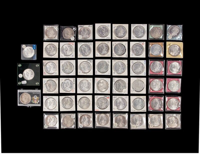 A Collection of Fifty-One Morgan $1 Coins (1 of 2)