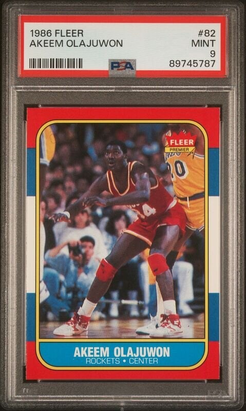 A 1986-87 Hakeem (Akeem) Olajuwon Rookie Basketball Card No. 82 (PSA 9 MINT) (1 of 2)