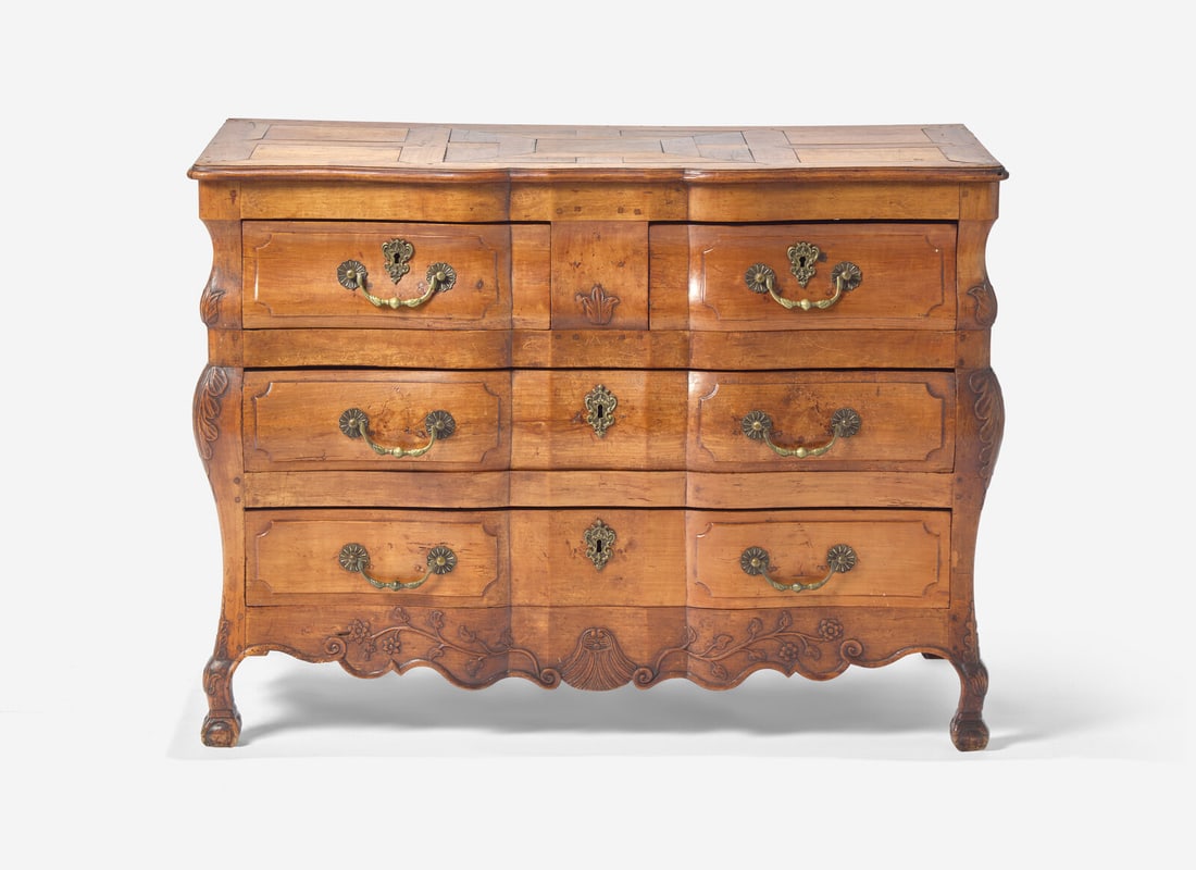 A Louis XV Provincial Carved Fruitwood Serpentine and Paneled-Top Bombé Commode (1 of 4)