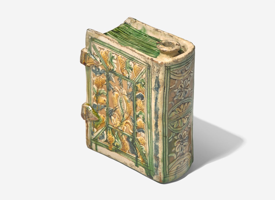 A Continental Faience Pottery Book-Form Flask: A Continental Faience Pottery Book-Form Flask Possibly German, 17th century Height 7 x width 3 x depth 5 1/2 inches. Provenance: Aline Thorold (1869-1951) m. Ernest James Wythes (1868-1949) at Copped