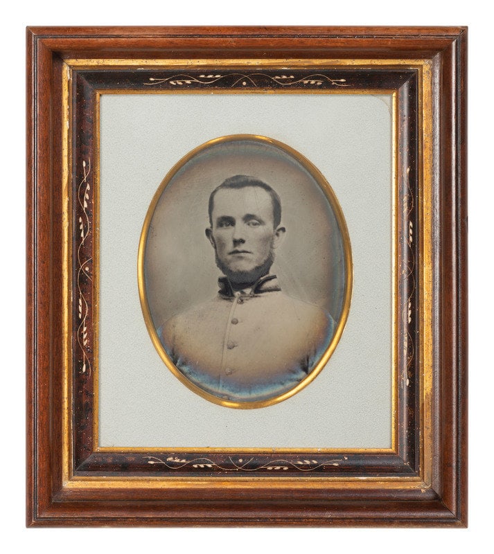 [CIVIL WAR]. Full plate tintype copy portrait of an unidentified soldier, likely Confederate. : [CIVIL WAR]. Full plate tintype copy portrait of an unidentified soldier, likely Confederate. Approx. 6 3/8 x 8 3/8 in. oval tintype copy portrait. (Tarnishing to edges, significant surface scratches 