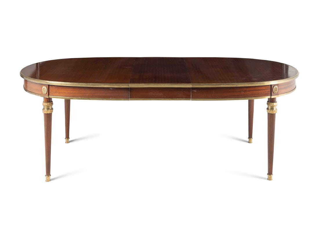 A Louis XVI Style Gilt Bronze Mounted Mahogany Dining Table (1 of 5)