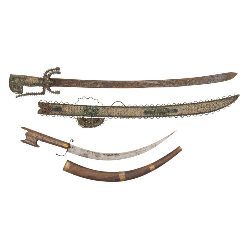 Lot of 2 Nimchas Including: Heavily Decorated Palache Style Sword: Lot of 2 Nimchas Including: Heavily Decorated Palache Style Sword 1.) 16" blade length. 24" overall with scabbard and hilt. Single edge curved blade with chiseled geometric pattern flowing along the b