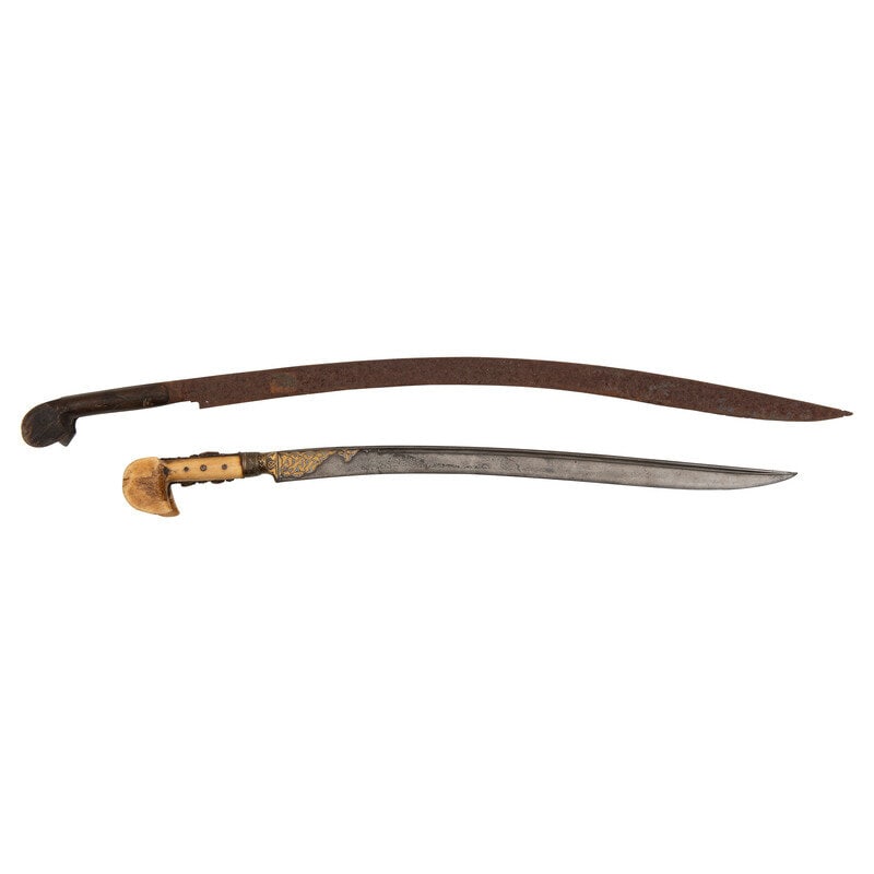 Lot of 2 Ottoman Yatagan Swords: Lot of 2 Ottoman Yatagan Swords Lot Includes: 1.) 21" watered steel blade. 27" overall with hilt. Single edge recurve blade with a straight point and single offset fullers and quill fullers to both si