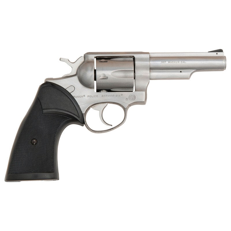 *Ruger Stainless Police Service Six Revolver with Pachmayr Grips: *Ruger Stainless Police Service Six Revolver with Pachmayr Grips .357 Magnum. 4" barrel length. SN: 152-92335. Brushed stainless steel finish overall mounting checkered black rubber PACHMAYR marked ta