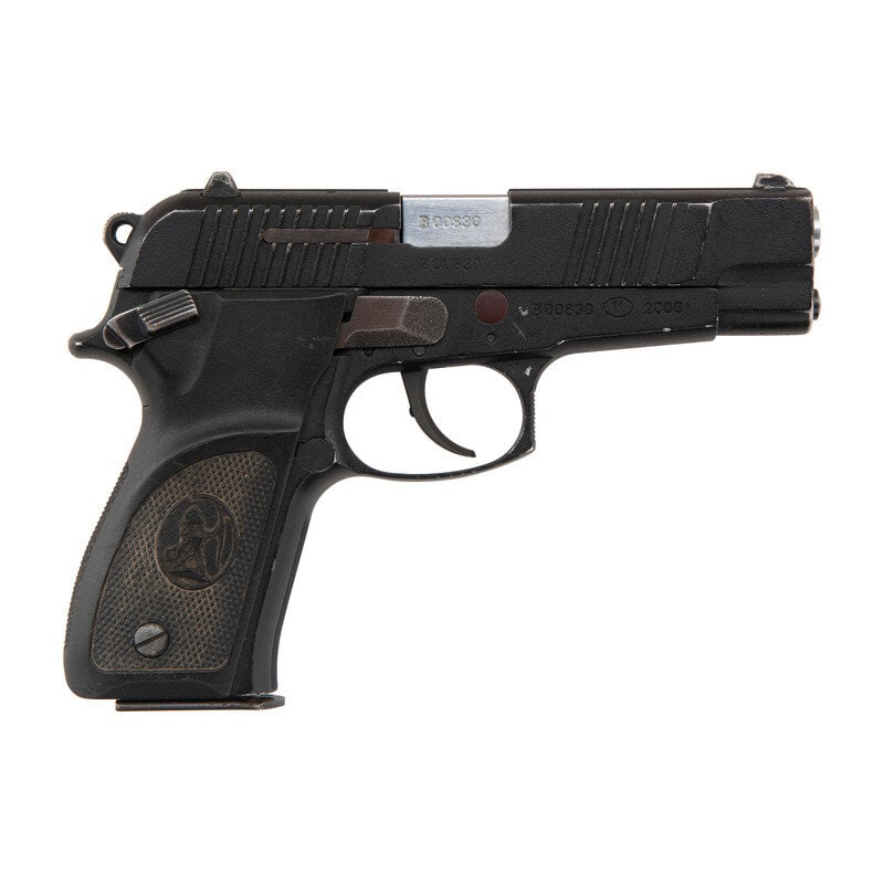*MAG-98 with Holster and Two Magazines: *MAG-98 with Holster and Two Magazines 9mm Para. 4.5" barrel length. SN: B00830. Black Parkerized metal finish overall mounting black synthetic grip panels and drift-adjustable rear notch and front bl