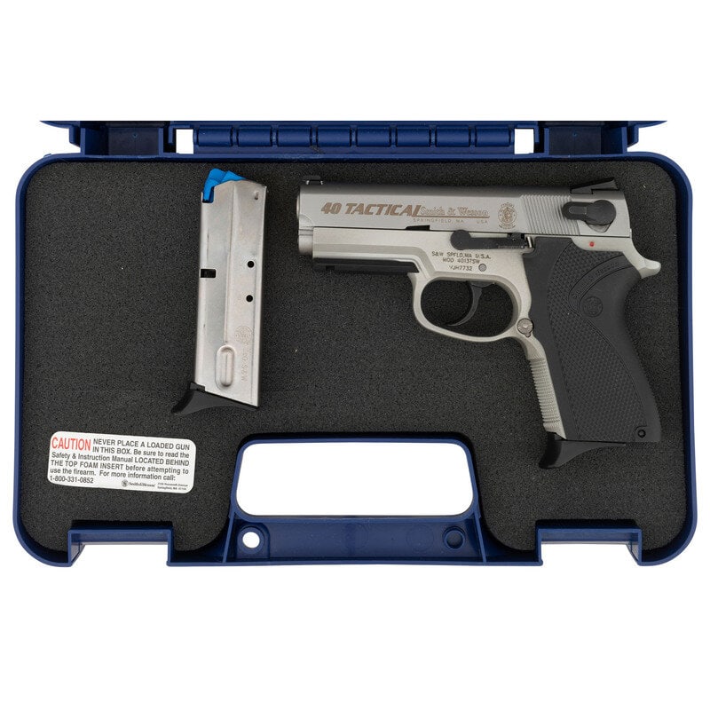 *Smith & Wesson Model 4013 TSW .40 Tactical in Box: *Smith & Wesson Model 4013 TSW .40 Tactical in Box .40 S&W. 3.5" barrel length. SN: VJH7732. Matte stainless steel finish with matte alloy frame, black synthetic Smith & Wesson logo grips,