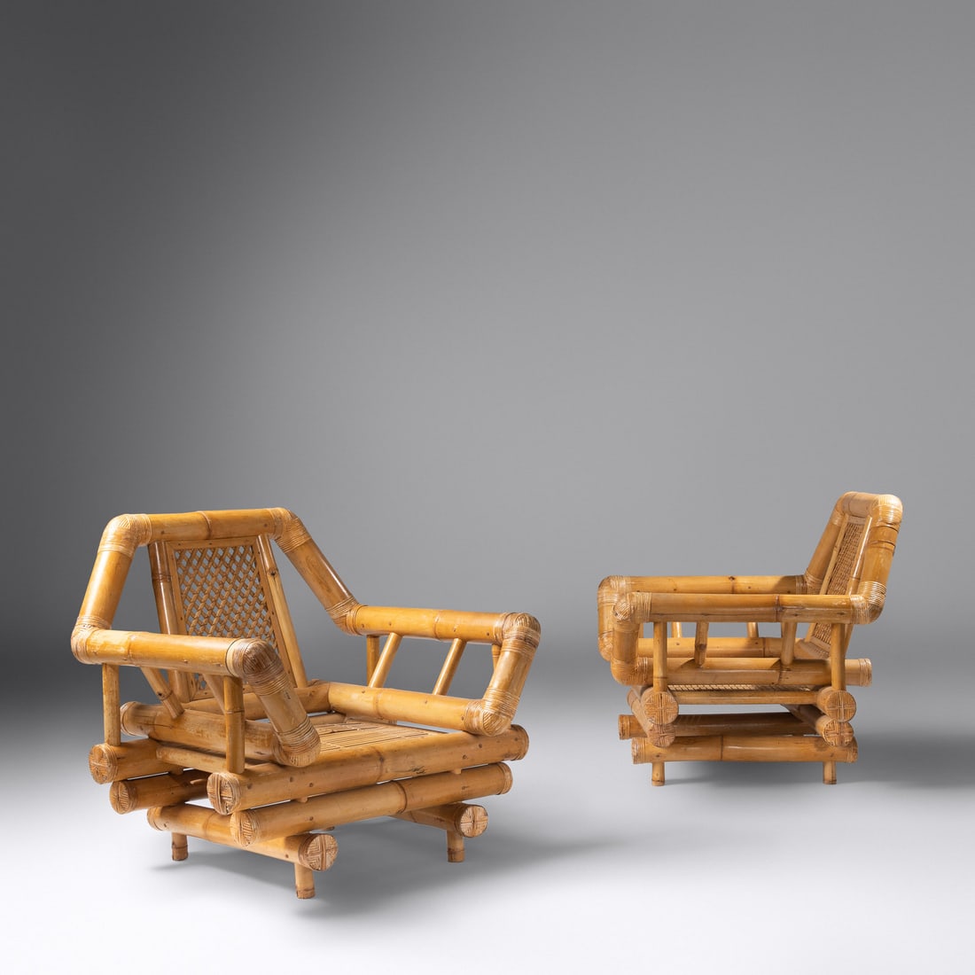 Italian Mid 20th Century Pair of Lounge Chairs, c. 1970: Italian Mid 20th Century Pair of Lounge Chairs, c. 1970 bamboo, cane 32 h × 33 w × 31 d inches.