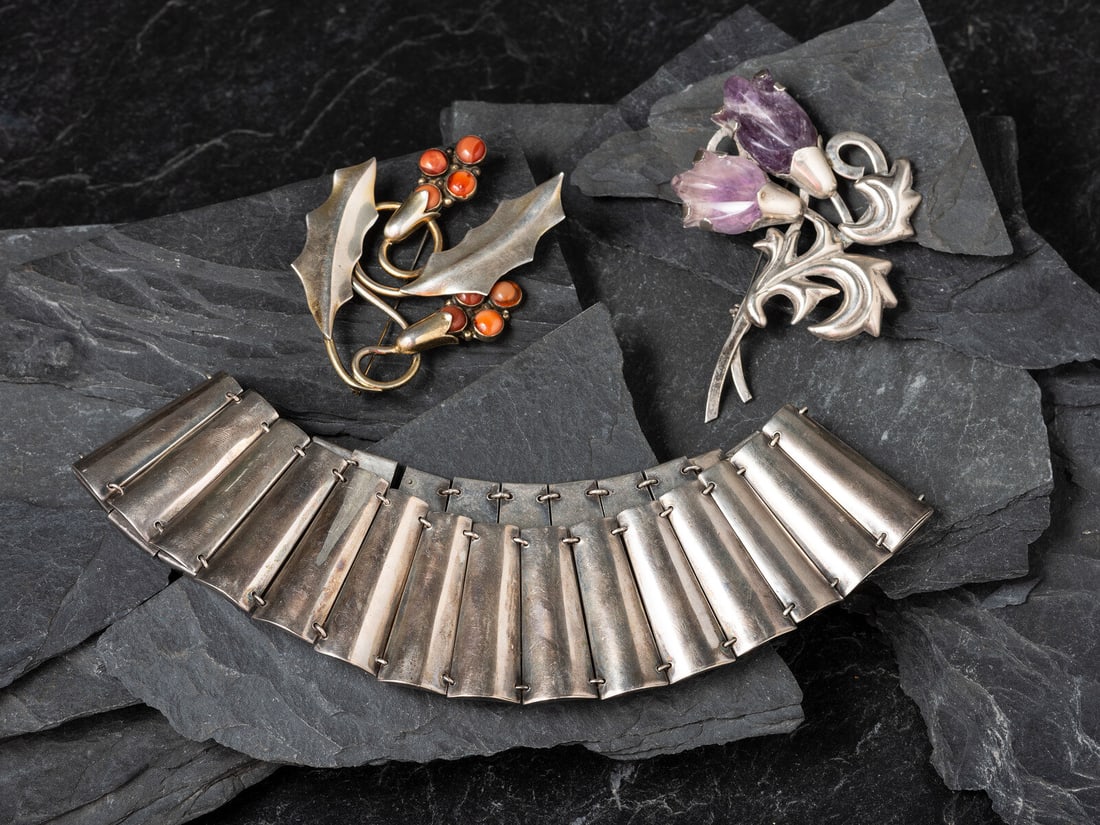 Fred Davis (American-born, 1880-1961) Mexican Silver Necklace and Floral Brooches/Pins: Fred Davis (American-born, 1880-1961) Mexican Silver Necklace and Floral Brooches/Pins lot of 3, all marked with the conjoined FD SILVER MADE IN MEXICO, includes: a fluted silver link choker circumfer
