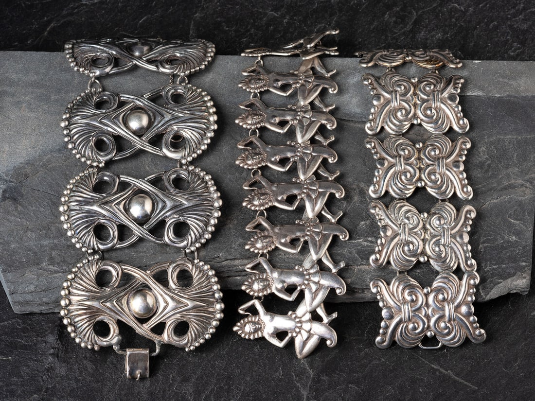 Los Castillo (Mexican, Shop, f. 1939) Taxco Sterling Silver Link Bracelets: Los Castillo (Mexican, Shop, f. 1939) Taxco Sterling Silver Link Bracelets lot of 3, all marked LOS CASTILLO TAXCO STERLING MADE IN MEXICO: one example made with interconnecting dancers; additionally