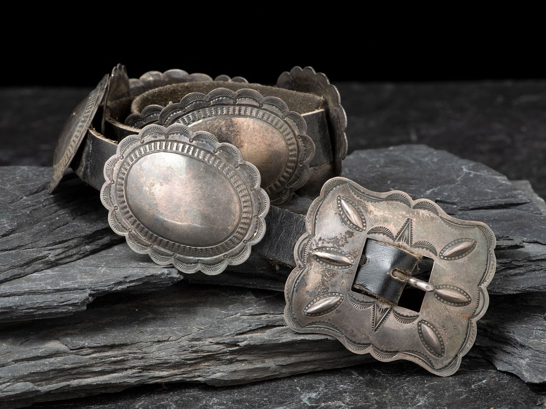 Navajo Sterling Silver Concha Belt: Navajo Sterling Silver Concha Belt second quarter - mid 20th century eight oval conchas and rectangular buckle; marked UITA21 STERLING belt length 29-1/2 inches, concha height 2 inches x length 2-5/8 