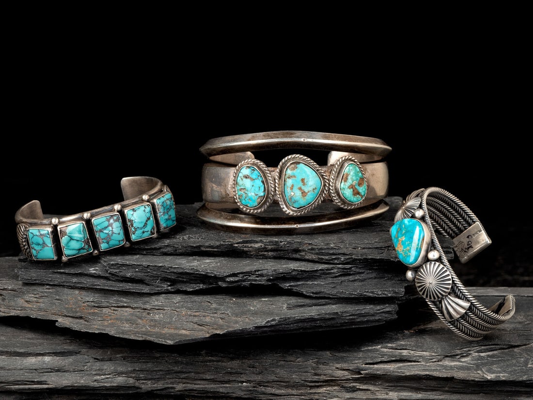 Navajo Silver and Turquoise Cuff Bracelets: Navajo Silver and Turquoise Cuff Bracelets second half 20th century lot of 3, includes: an example set with three stones in a rope bezel, not marked cuff width 1-1/2 inches, interior circumference 6 i