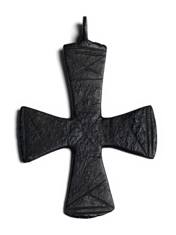 A Byzantine Bronze Cross: A Byzantine Bronze Cross Circa 7th-11th Century A.D. Height 3 1/8 inches (7.94 cm). Size Height 3 1/8 inches (7.94 cm). Provenance Provenance:Donald Wonder (1938-2023), Cali