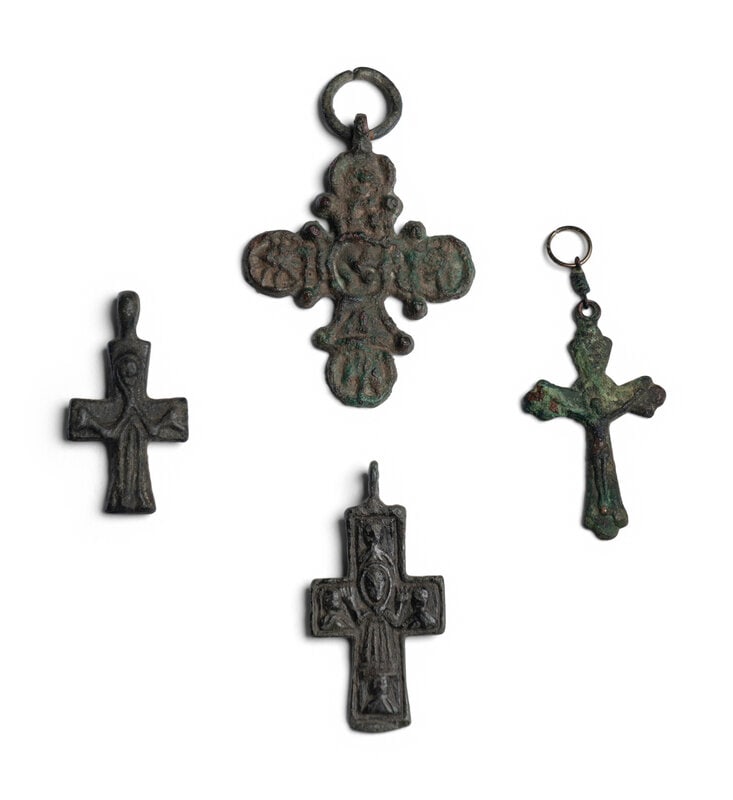 Four Byzantine Bronze Crosses: Four Byzantine Bronze Crosses Circa 7th-15th Century A.D. Height of largest 2 1/4 inches (5.72 cm). Size Height of largest 2 1/4 inches (5.72 cm). Provenance Provenance:Dona