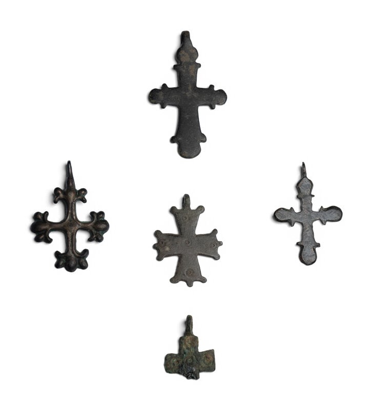 Five Byzantine Bronze Crosses: Five Byzantine Bronze Crosses Circa 6th-15th Century A.D. Height of largest 2 1/4 inches (5.72 cm). Size Height of largest 2 1/4 inches (5.72 cm). Provenance Provenance: