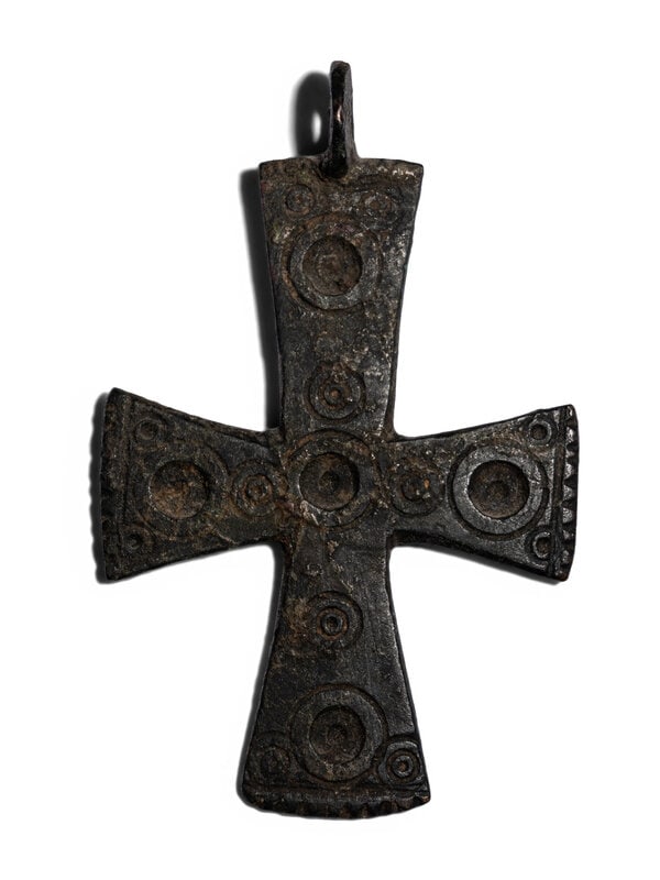 A Byzantine Bronze Cross: A Byzantine Bronze Cross Circa 7th-11th Century A.D. Height 3 1/8 inches (7.94 cm). Size Height 3 1/8 inches (7.94 cm). Provenance Provenance:Donald Wonder (1938-2023), Cali
