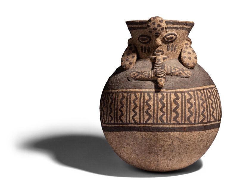 A Chancay Bichrome Vessel: A Chancay Bichrome Vessel Peru, Circa 1100-1400 A.D. Height 6 3/4 inches (17.15 cm). Size Height 6 3/4 inches (17.15 cm). Condition Inspected under UV light and 10x loupe. S