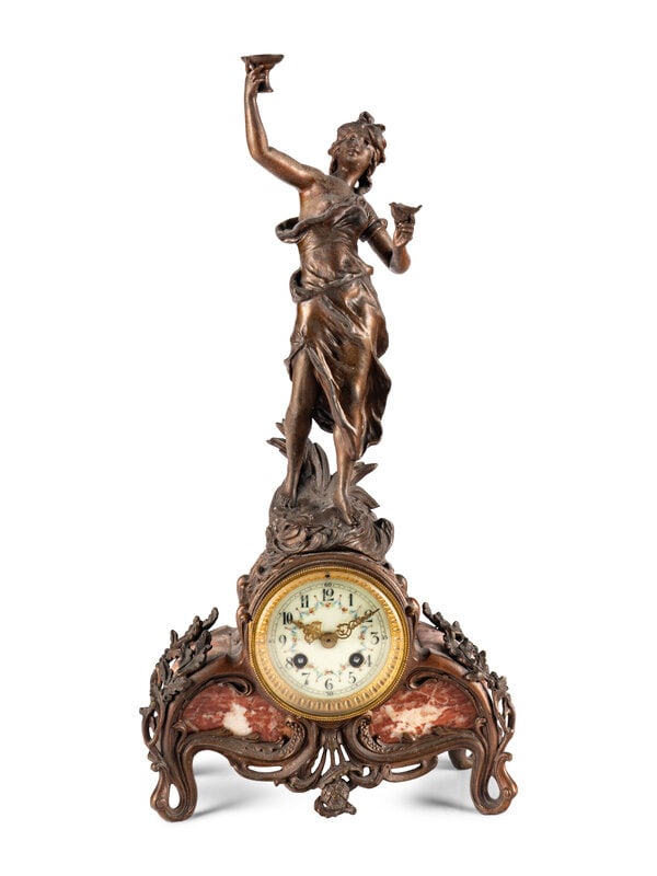 A French Cast Metal and Marble Figural Clock: A French Cast Metal and Marble Figural Clock 20th Century Height 20 x width 10 inches. This lot is located in Chicago. Property from the Estate of Macey and Hélène Feingold, C