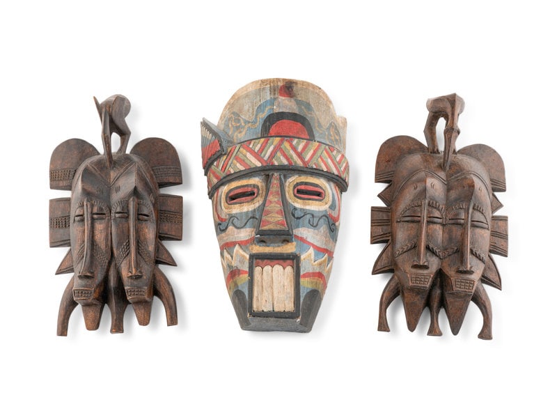 A Group of Three West African Carved Masks (1 of 3)