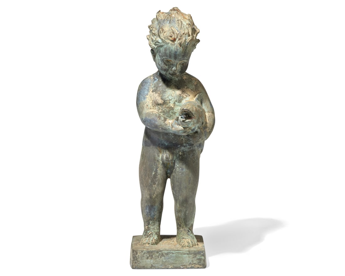 A cast zinc fountain head of a boy holding fish, 20th century: A cast zinc fountain head of a boy holding fish, 20th century H: 23 in. W: 6 ½ in. D: 6 ½ in. Provenance: A Main Line, Philadelphia collection.