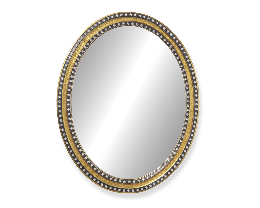 An Irish oval double-jeweled looking glass, 20th century (1 of 2)