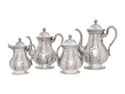 A Rare Grosjean and Woodward for Tiffany and Co. Silver Four-Piece Tea and Coffee Service: A Rare Grosjean and Woodward for Tiffany and Co. Silver Four-Piece Tea and Coffee Service New York, NY, Mid 19th Centurycomprising a teapot, coffee pot, milk jug and covered sugar, each marked '550