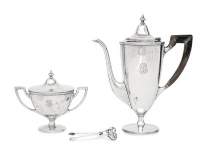 A Tiffany and Co. Silver Coffee Pot and Covered Sugar: A Tiffany and Co. Silver Coffee Pot and Covered Sugar New York, NY, Circa 1910each with script B monogram, together with a par of Georg Jensen silver sugar nips. each marked 'Sterling' 27 ozt 2 dwts