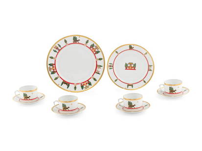 A Cartier La Maison de Louis Porcelain Dinner Service: A Cartier La Maison de Louis Porcelain Dinner Service 20th/21st Centurycomprising: 12 dinner plates 12 salad plates 6 teacups 8 saucers; 40 items total. Diameter of dinner plates 10 1/4 inches. This