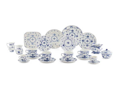 A Royal Copenhagen Blue Fluted Porcelain Tea Service: A Royal Copenhagen Blue Fluted Porcelain Tea Service 20th Century each with factory stamps and three-wave mark to underside, comprising: 8 dessert plates with reticulated borders 8 teacups 8 saucers