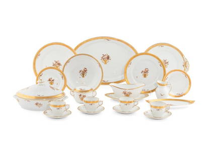 A Royal Copenhagen Golden Basket Porcelain Dinner Service: ﻿A Royal Copenhagen Golden Basket Porcelain Dinner Service comprising: 12 dinner plates 12 salad plates 12 bread and butter plates 12 covered twin handled soup bowls 12 saucers 8 teacups 8