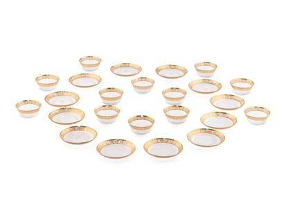 A Set of Saint-Louis Cut Glass Table Articles: A Set of Saint-Louis Cut Glass Table Articles Thistle pattern, comprising twelve bread plates and twelve fruit bowls; 24 items total. Height of bowls 2 inches; diameter of plates 6 inches. This lot