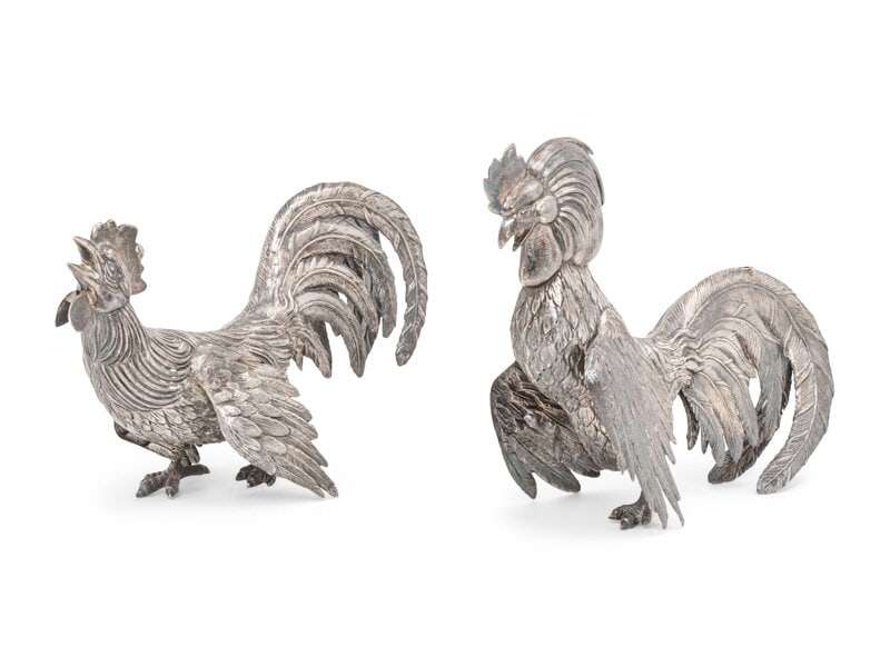 A Pair of Spanish Silver Cockerels: A Pair of Spanish Silver Cockerels 20th Century each marked with a five-point star to the tail feathers 20 ozt 15 dwt gross Height 6 x width 3 1/2 x depth 9 inches. This l