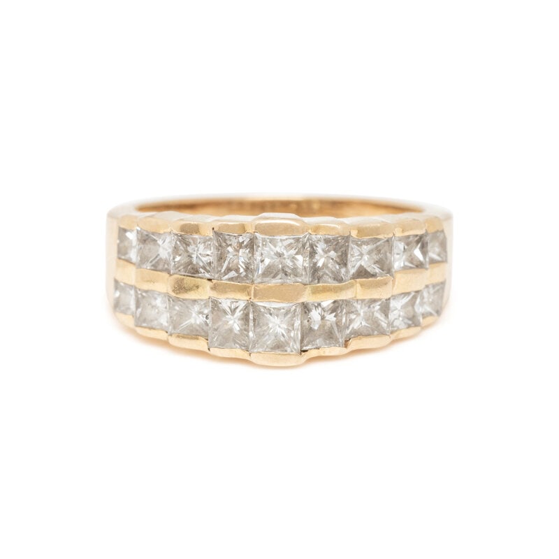 YELLOW GOLD AND DIAMOND RING: YELLOW GOLD AND DIAMOND RING Princess cut diamonds weighing approximately 1.85 carats total. 14 karat yellow gold. Ring size 6 3/4. Stamp: 14K (maker's mark). Gross weight: 3.35 dwt. This