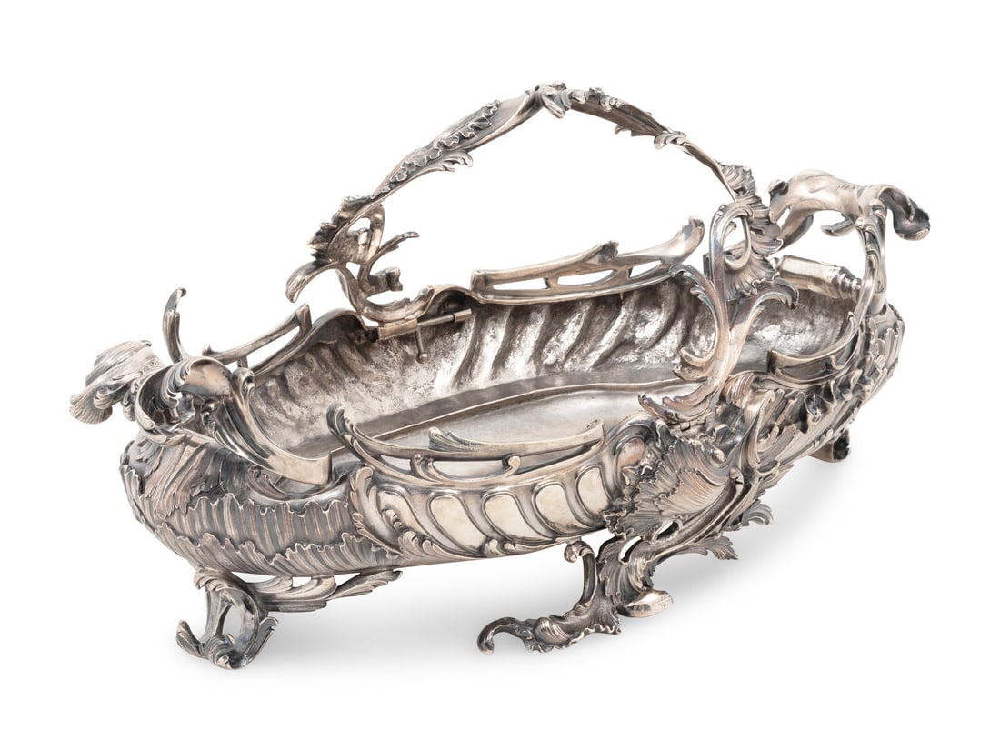 A French Silver Centerpiece Basket: A French Silver Centerpiece Basket Alphonse Debain, Paris, Circa 1900 marked with '950' standard on underside 103 ozt 6 dwt Height 9 x width 17 1/2 x depth 8 3/4 inches. This lot is located in Chicago