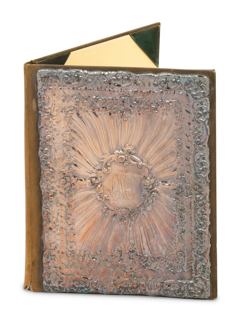A Repoussé Silver-Mounted Leather Portfolio: A Repoussé Silver-Mounted Leather Portfolio 19th/20th Century apparently unmarked. Height 11 3/4 x width 9 1/4 inches. This lot is located in Chicago. Property from The Private Collection of Ms.