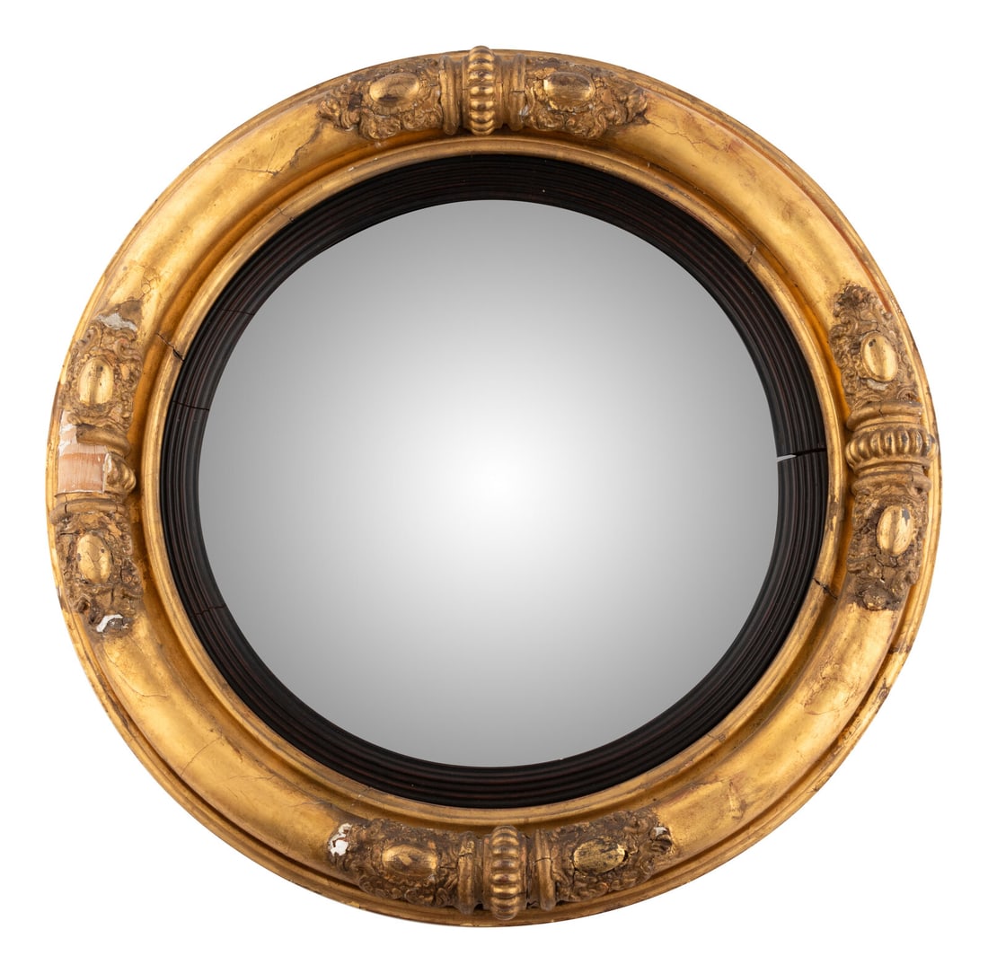 A Classical Carved Giltwood and Gesso Bull's Eye Mirror: A Classical Carved Giltwood and Gesso Bull's Eye Mirror First Half 19th Century Diameter 22 inches. This lot is located in Chicago. Property from The Private Collection of Ms. Darla Moore, Charleston,
