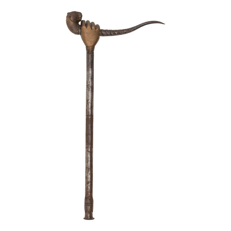 A 19th Century Indo-Persian Fakir's Crutch with Stiletto Spike Blade: A 19th Century Indo-Persian Fakir's Crutch with Stiletto Spike Blade 14" stiletto spike blade. 18.75" x 9" overall with hilt and haft. Fakir's crutch with a 15.25" steel haft that is etched with faint