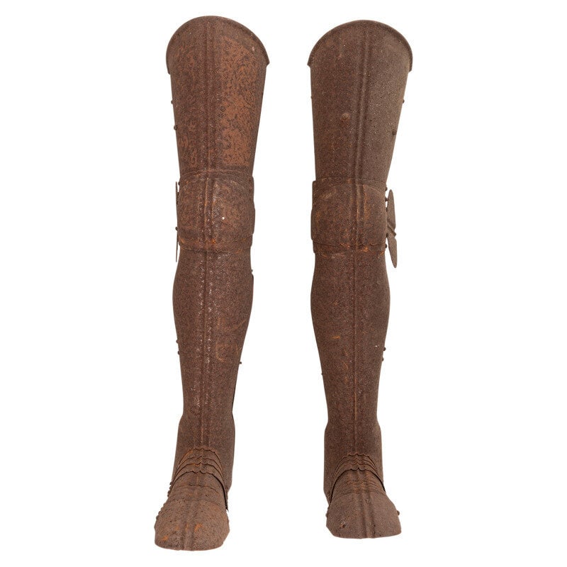 Pair of 19th Century Victorian-Style Plated Leg Armor: Pair of 19th Century Victorian-Style Plated Leg Armor Both pieces of armor are about 32" x 13" x 5". Both appear to have floral scroll style etched designs overall, with articulated sabatons and hinge