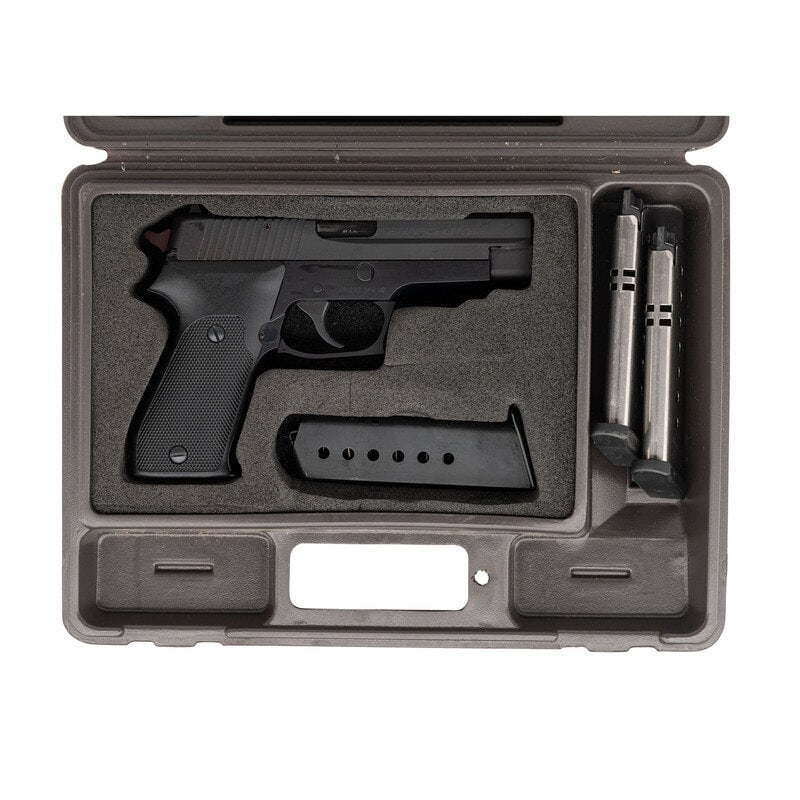 *West German Sig P220 .45 in Box with Accessories: *West German Sig P220 .45 in Box with Accessories .45 ACP. 4.4" barrel length. SN: G233364. Parkerized metal finish with black anodized frame mounting checkered black synthetic grips and two dot sight