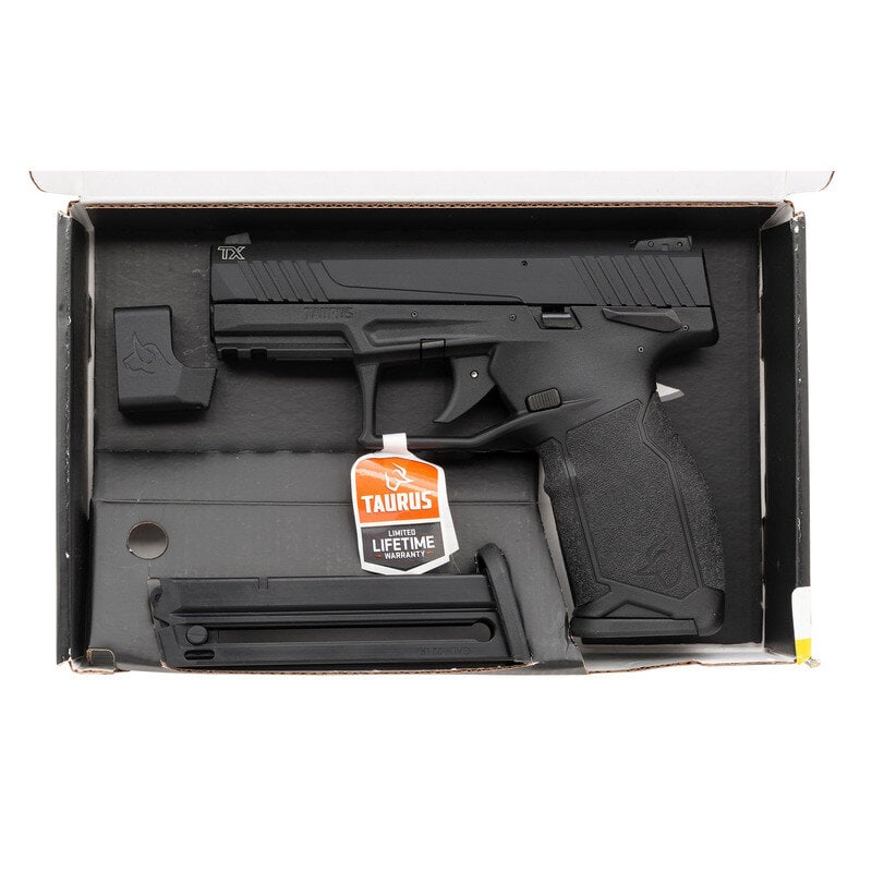 *Taurus TX22 with Threaded Barrel in Box: *Taurus TX22 with Threaded Barrel in Box .22 LR. 4.1" barrel length. SN: 1PT488519. Black Nitride finish overall mounting black synthetic frame featuring an accessory rail to dustcover, adjustable syn