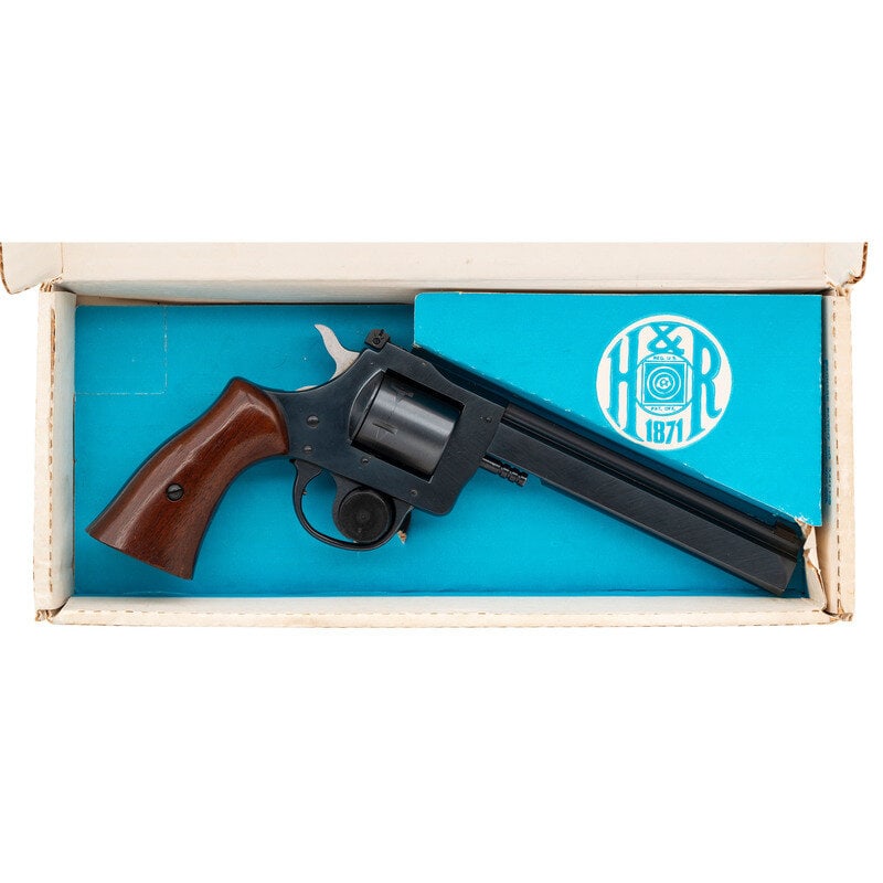 *Harrington & Richardson Model 603 .22 Magnum Rimfire in Box: *Harrington & Richardson Model 603 .22 Magnum Rimfire in Box .22 WMRF. 6" barrel length. SN: AU189910. Blued metal finish with hammer left in the white mounting two piece walnut smooth finished st