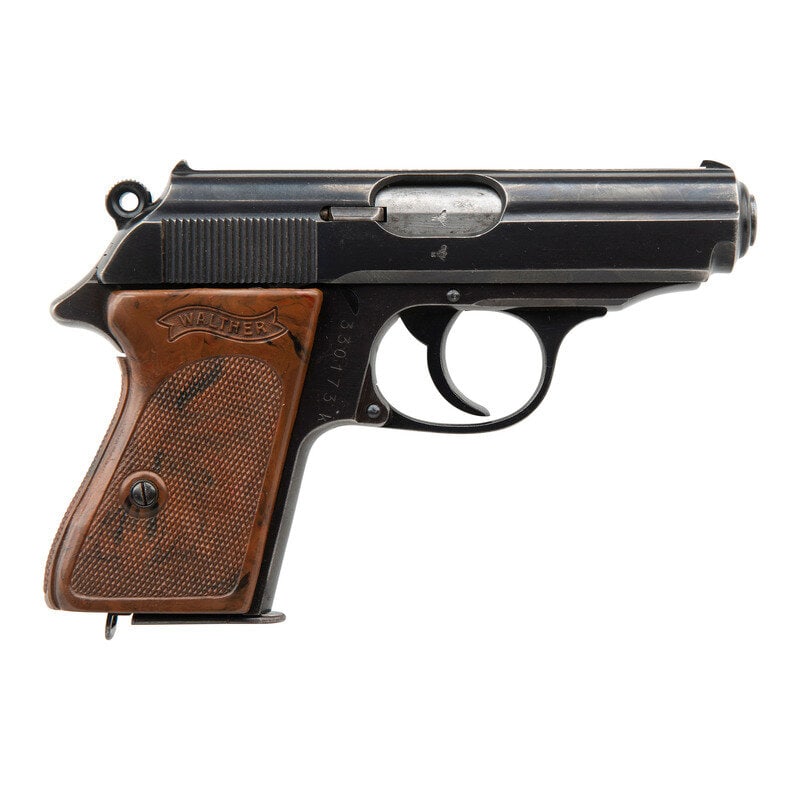 **1941 Commercial Walther PPK .32: **1941 Commercial Walther PPK .32 World War II .32 ACP. 3.3" barrel length. SN: 330173K. Blued metal finish with polished chamber mounting one piece wrap-around WALTHER banner brown synthetic grips. S