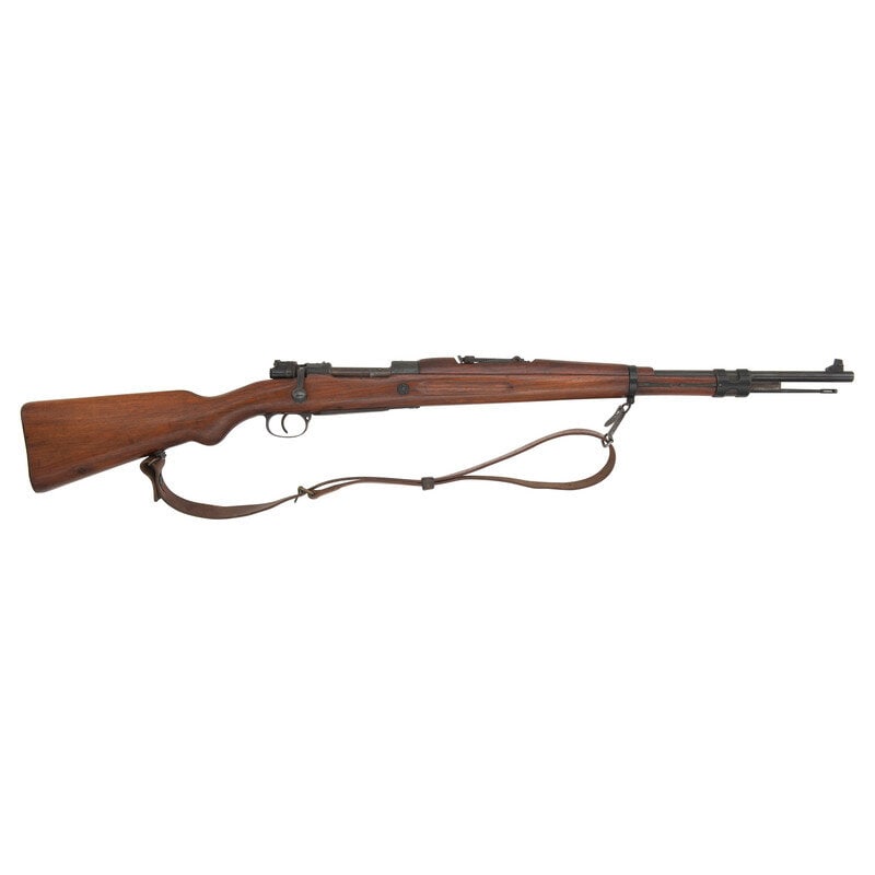 **German dou/42-Code G.24(t) Rifle: **German dou/42-Code G.24(t) Rifle World War II 8mm Mauser. 24" barrel. SN: 5223g. Blued metal finish. Walnut stock has a plain semi pistol grip and forearm, with grasping grooves and handguard. Bolt