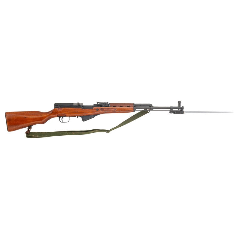 *Chinese Norinco SKS Rifle: *Chinese Norinco SKS Rifle 7.62x39mm. 20.5" barrel length. SN: 51558. Blued metal finish with steel bolt. Hardwood stock has a plain semi pistol grip and forearm, with grasping grooves and textured sy