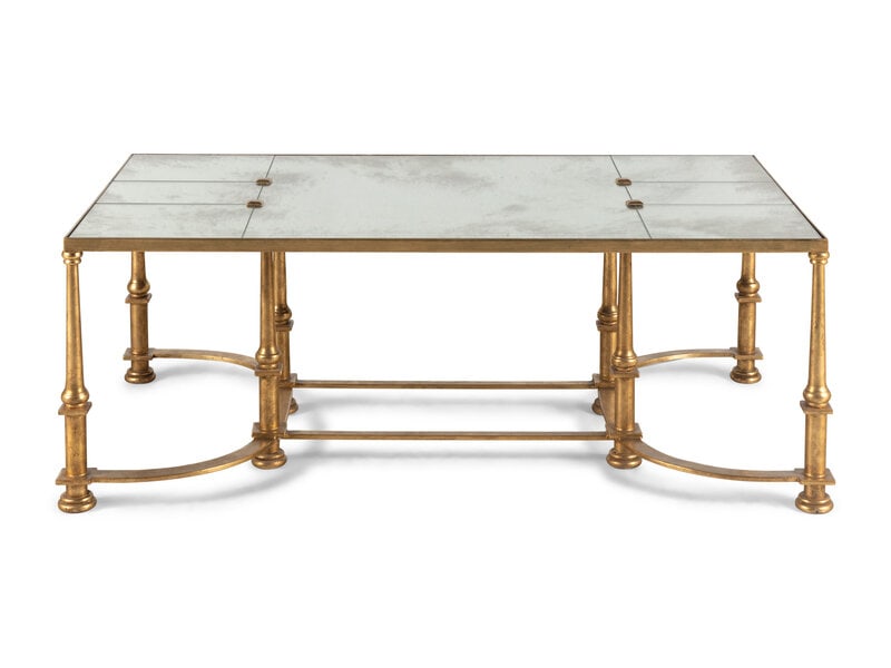 An Ebanista Guerlain Low Table: An Ebanista Guerlain Low Table gilt metal, with a mirror-inset top. Height 19 1/2 x width 54 x depth 30 inches. This lot is located in Chicago.