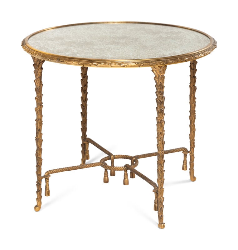 A Gilt Bronze Side Table by Maison Charles: A Gilt Bronze Side Table by Maison Charles 20th Century Height 21 x diameter 26 inches. This lot is located in Chicago.