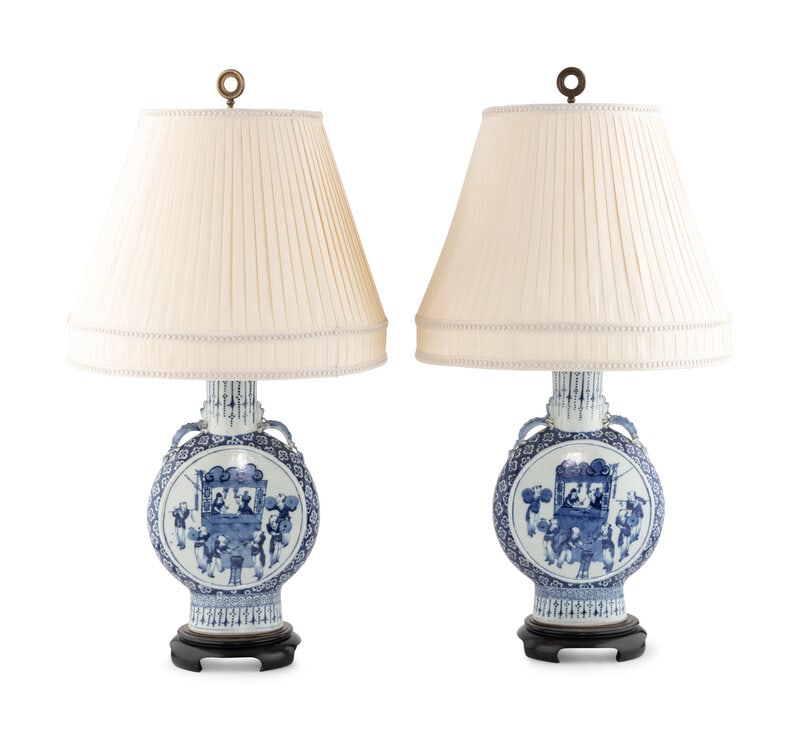 A Pair of Chinese Export Porcelain Moon Flasks Mounted as Lamps : A Pair of Chinese Export Porcelain Moon Flasks Mounted as Lamps 20th Century with silk shades. Height of flasks (on stand) 18 inches. This lot is located in Chicago.