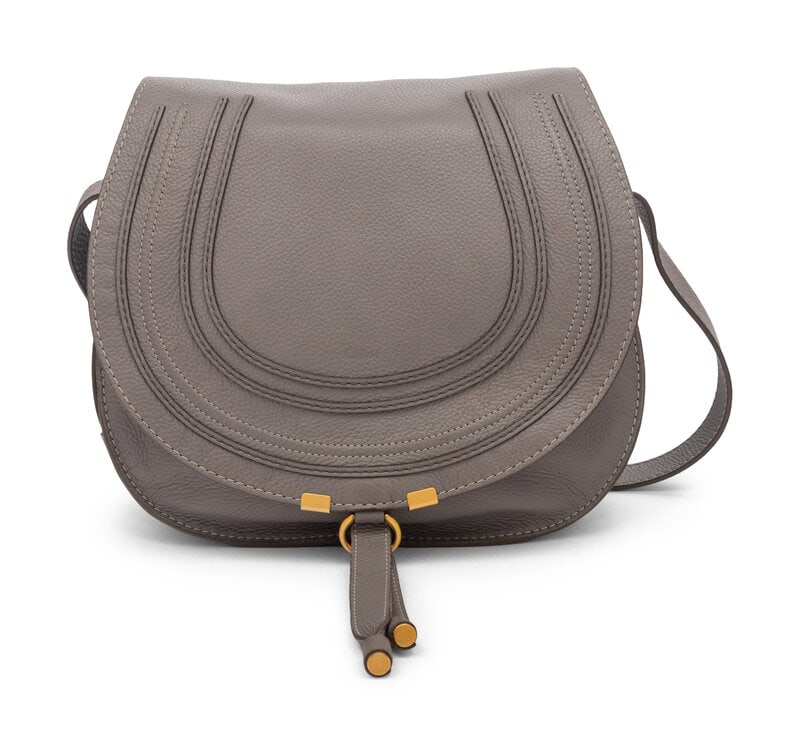 Grey Marcie Saddle Bag by Chloé: Grey Marcie Saddle Bag by Chloé Marcie Saddle Bag in Grey Grained Calfskin with Gold-Tone Hardware. Label: Chloé Style/Serial Number: 01556665-10 Country of Origin: Italy